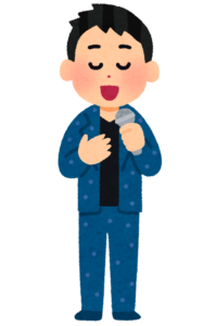 マイクを持って歌う人のイラスト
