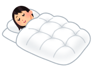 布団で眠る人のイラスト