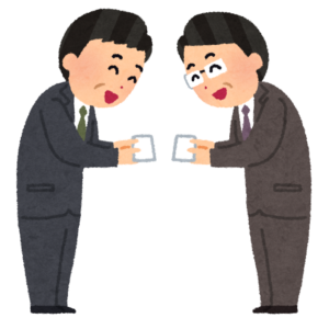 名刺交換をするビジネスマン