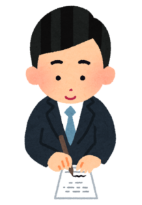 書類に署名する男性