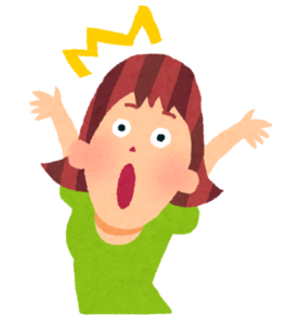 目を大きく開けて驚く女性
