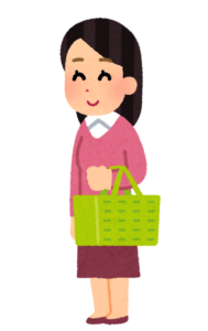 買い物カゴを持つ女性