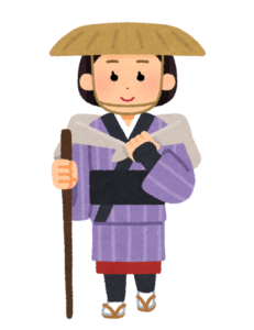 杖を持った旅装束の女性のイラスト