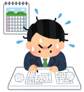 締め切りに追われて机で書類を書く男性のイラスト