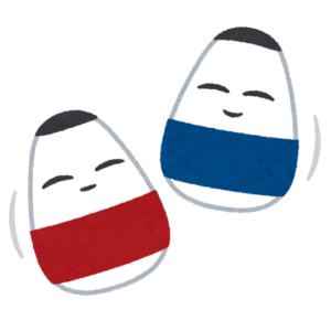 起き上がり小法師が二つ並んでいるイラスト