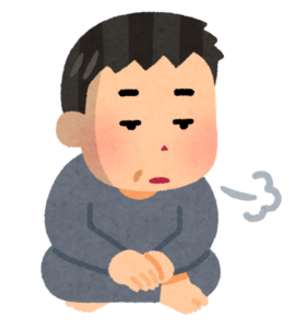 ぼんやりと座り込んだ男性のイラスト