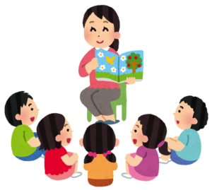 子どもたちに絵本を読み聞かせる大人のイラスト