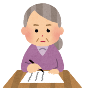 机で書き物をするおばあさんのイラスト