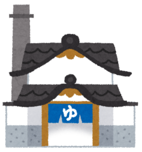 煙突と「ゆ」の暖簾がある銭湯の建物のイラスト