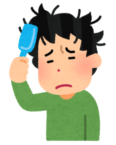 寝ぐせをブラシで直そうとしている男性のイラスト