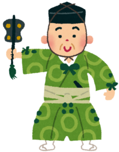 軍配を掲げる相撲の行司