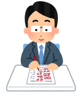 答案に赤ペンで丸をつけている先生のイラスト