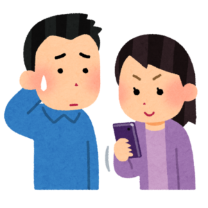 スマホを見る女性の横で困った顔をする男性