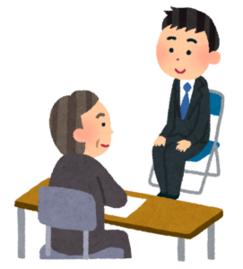 面接官と向き合って面接を受ける男性のイラスト