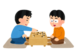 子ども二人が碁盤に石を打っているイラスト