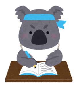 机に向かって勉強しているコアラのイラスト